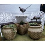 Three decorative garden planters, a pair of reconstituted stone twin handled urns and a flared