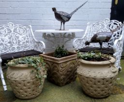 Three decorative garden planters, a pair of reconstituted stone twin handled urns and a flared