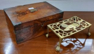 A Victorian flamed mahogany work box c.1860, vacant cartouche; a 19th century brass trivet with