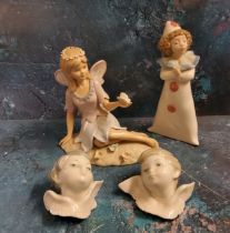 A Lladro 'Reynold's Angel;  another;  a Nao figure of a young clown;  a Leonardo Collection angel (