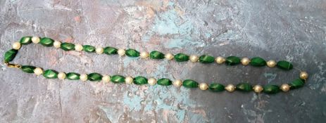 A malachite and fresh water pearl necklace, with alternating stones, 9ct clasp, 66cm long