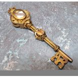 A Victorian gilt metal & enamel presentation key awarded to Lady Stanley of Preston on the