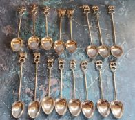 Sixteen Indian tea and coffee spoons, each with mystical beast, elephant or mask terminal