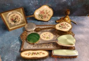 A Regent of London gilt metal and embroidered dressing table set, comprising easel clock, dressing