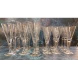 A set of nine Dartington crystal Sharon wine glasses, conical bowls, bubbled stems, 22cm high;  nine