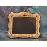 A modern Victorian style silver photograph frame, embossed with scrolls and anthemions, 20cm x 24cm