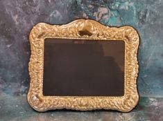 A modern Victorian style silver photograph frame, embossed with scrolls and anthemions, 20cm x 24cm