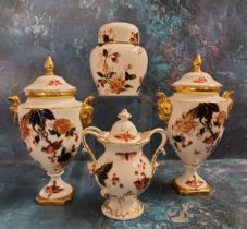 A Coalport Hong Kong pattern pedestal ovoid vase and cover, rams mask handles, 23cm high, printed