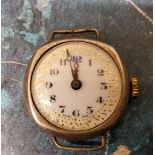 An early 20th century trench form wristwatch