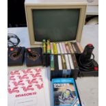 A Commodore computer, Type 76BM13/O5E; various games including Dragon 32, Planet Invasion, Space