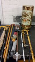 A truncheon;  shooting sticks;  umbrellas;  waling sticks;  a Japanese satsuma style stick stand (