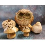 An unusual stoneware novelty owl, 24cm high;  another, smaller;  an apple;  two toadstools (6)