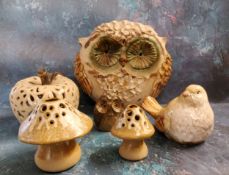 An unusual stoneware novelty owl, 24cm high;  another, smaller;  an apple;  two toadstools (6)
