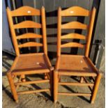 A pair of 19th century simulated bamboo elm ladder back chairs, c.1890