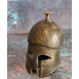 A Grand Tour novelty desk weight, in the form of an Ancient Greek helmet, 12cm high