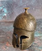 A Grand Tour novelty desk weight, in the form of an Ancient Greek helmet, 12cm high
