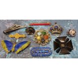 Vintage brooches including a Celtic white metal brooch set with semi precious cabochon stones; a