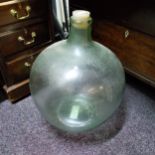 A large glass carboy