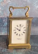 A 20th century Garrard & Co Ltd brass carriage clock, Roman numerals, bevel glass, 12.5cm high