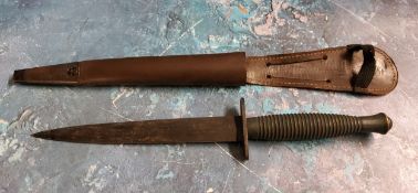 A Fairbairn Sykes style Commando knife, with leg/belt sheath