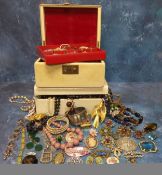 A vintage wooden jewellery box containing costume jewellery including faux pearl & bead necklaces,