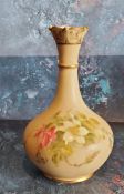 A Royal Worcester bottle vase, printed and painted with roses on a blush ivory ground, picked out in