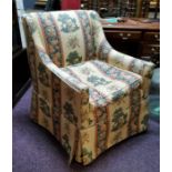 A 20th century country house snug chair in Warner & Sons 'Epping Forest' pattern upholstery designed