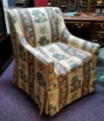 A 20th century country house snug chair in Warner & Sons 'Epping Forest' pattern upholstery designed
