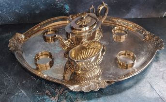 A Walker and Hall three piece hall fluted bachelor's tea service, shaped ova tray ensuite, with four