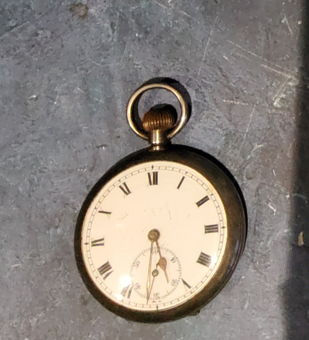 A continental  silver open faced pocket watch, Roman numerals, subsidiary seconds dial, the back