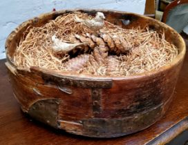 A rustic farmhouse metal bound bowl, riveted and restored with ironwork straps and staples
