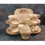 A Royal Standard Country Lane pattern part tea service, comprising four cups, five saucers, six side