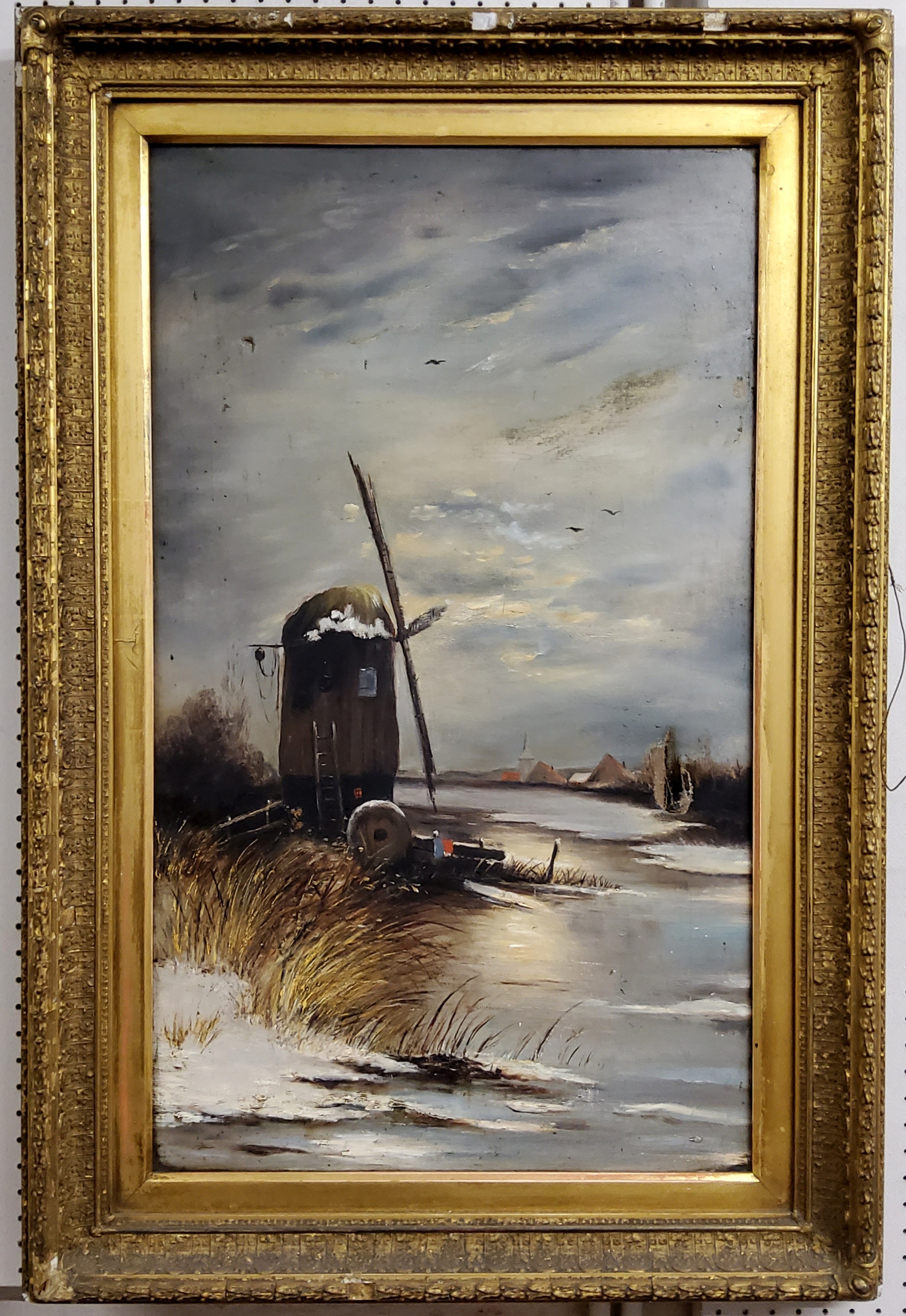 Dutch School (20th Century) Windmill In Winter  Oil on canvas, period gilt frame 90cm high x 56cm