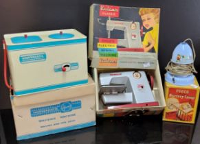 A Chad Valley tinplate Hoover Matic washing machine, boxed;  Vulcan Classic Child's Electric