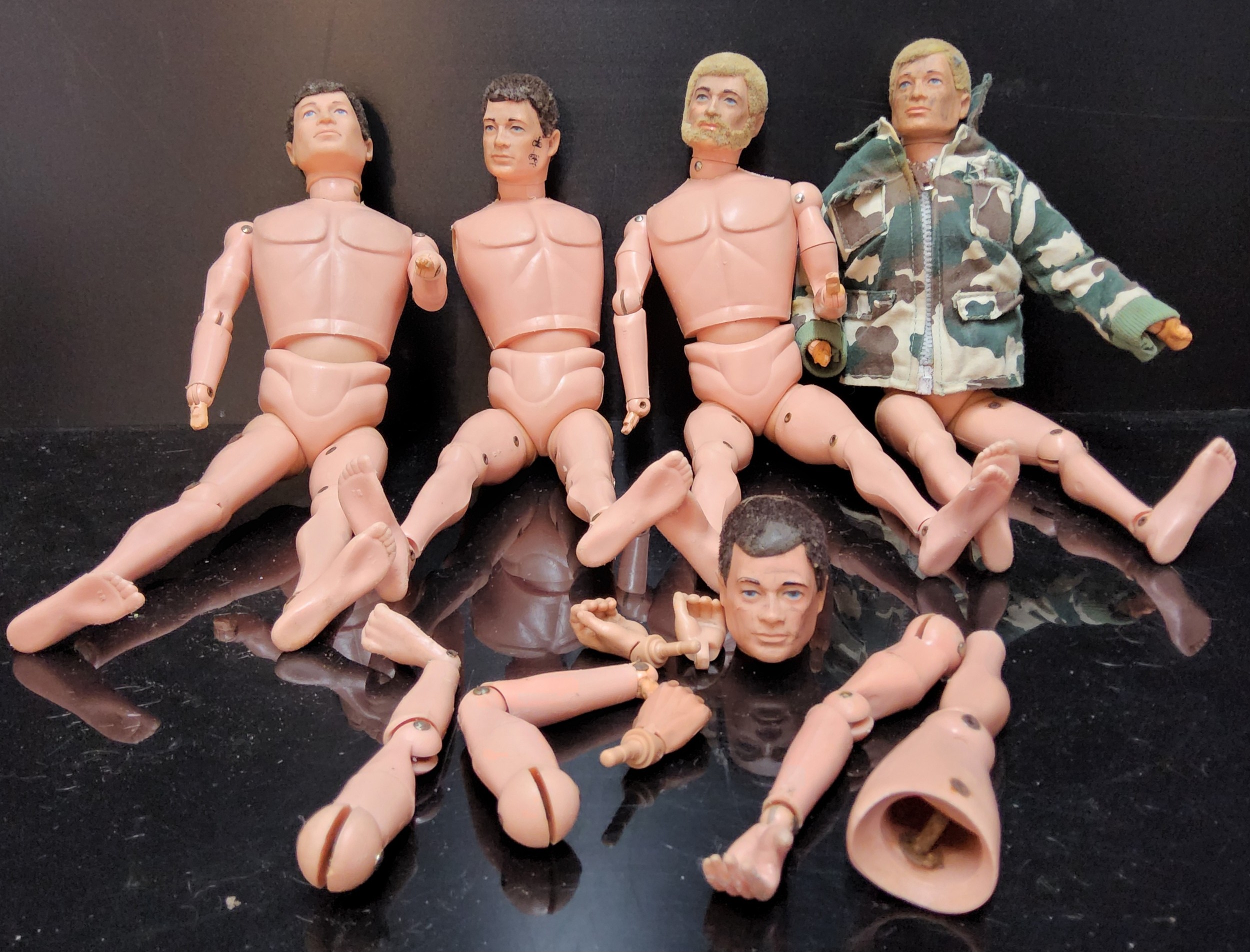 Four Pallitoy Flock Hair Action Man, two dark hair (no beards), two blonde (one with beard) along