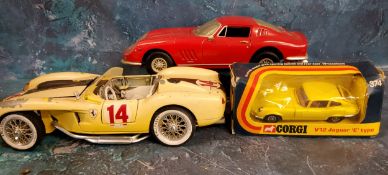 A Burago Ferrari Testa Rossa 1957,  in yellow, unboxed;   another, Ferrari 246 GT 124;  a Corgi