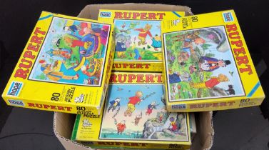Four Hope Rupert 80 piece Jigsaw puzzles;  Merit Picture Dominoes;  The Age of Steam 500 piece
