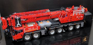 A Kit Built 17013 GMK Mobile Crane Overall length 73cm. with remote cotrol, manual and box