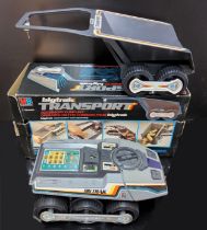 A BIGTRAK and Bigtrak tipping trailer, Grey U.S.A version (white wheels) A 1980's grey USA version