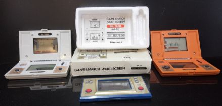 Three Nintendo game and watch electronic games, Donkey Kong, Fire and Oil Panic (boxed) Nintendo