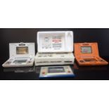 Three Nintendo game and watch electronic games, Donkey Kong, Fire and Oil Panic (boxed) Nintendo