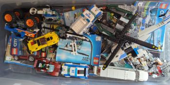Lego - a Quantity of Lego City including helicopter, Limo, police van, Corvette, police car,etc.