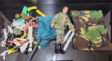 Action Man - an 1993 brown fuzzy hair figure, camouflage uniform, accessories including scuba,