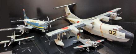 Eight WWII Japanese Kit Built Model Aircraft, mono and bi wing fighters, bombers, etc. (All appear