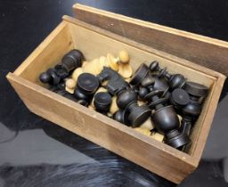 A 20th century boxwood and ebonised chess set, the king 8.25cm high