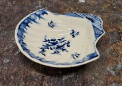 A Derby shell shaped pickle dish, painted in underglaze blue with floral sprays, 11cm wide, Godden