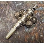 A 19th century silver child's rattle, chased with flowers and scrolling foliage, whistle terminal,