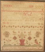 A Victorian needlework sampler, embroidered by Mary Ryals, age 8 with alphabet, stylised animals and