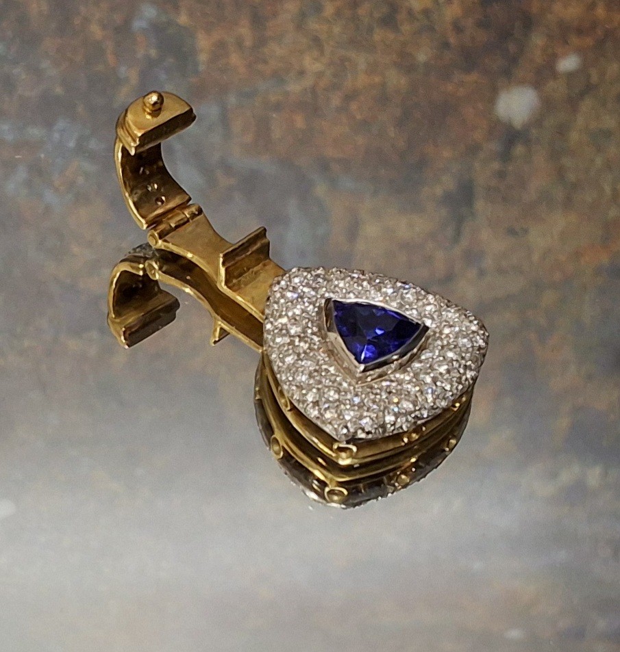 A 18ct gold South African Tanzanite and diamond Reuleaux shaped pendant, a central collett set - Image 2 of 2