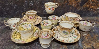 A Minton cup, saucer and side plate, pattern 676, decorated with colourful summer flowers within a